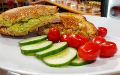 Roasted Red Pepper Hummus, Avocado, and Feta Sandwich with Rustlin’ Rob’s Spicy Chipotle Garnishing Squeeze