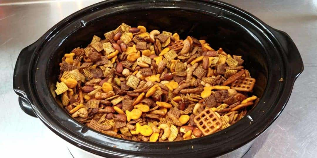 Slow Cooker CHEX PARTY MIX made with Rustlin’ Rob’s Cajun Seasoning, Rattlesnake Bite, Very Very Hot Sauce